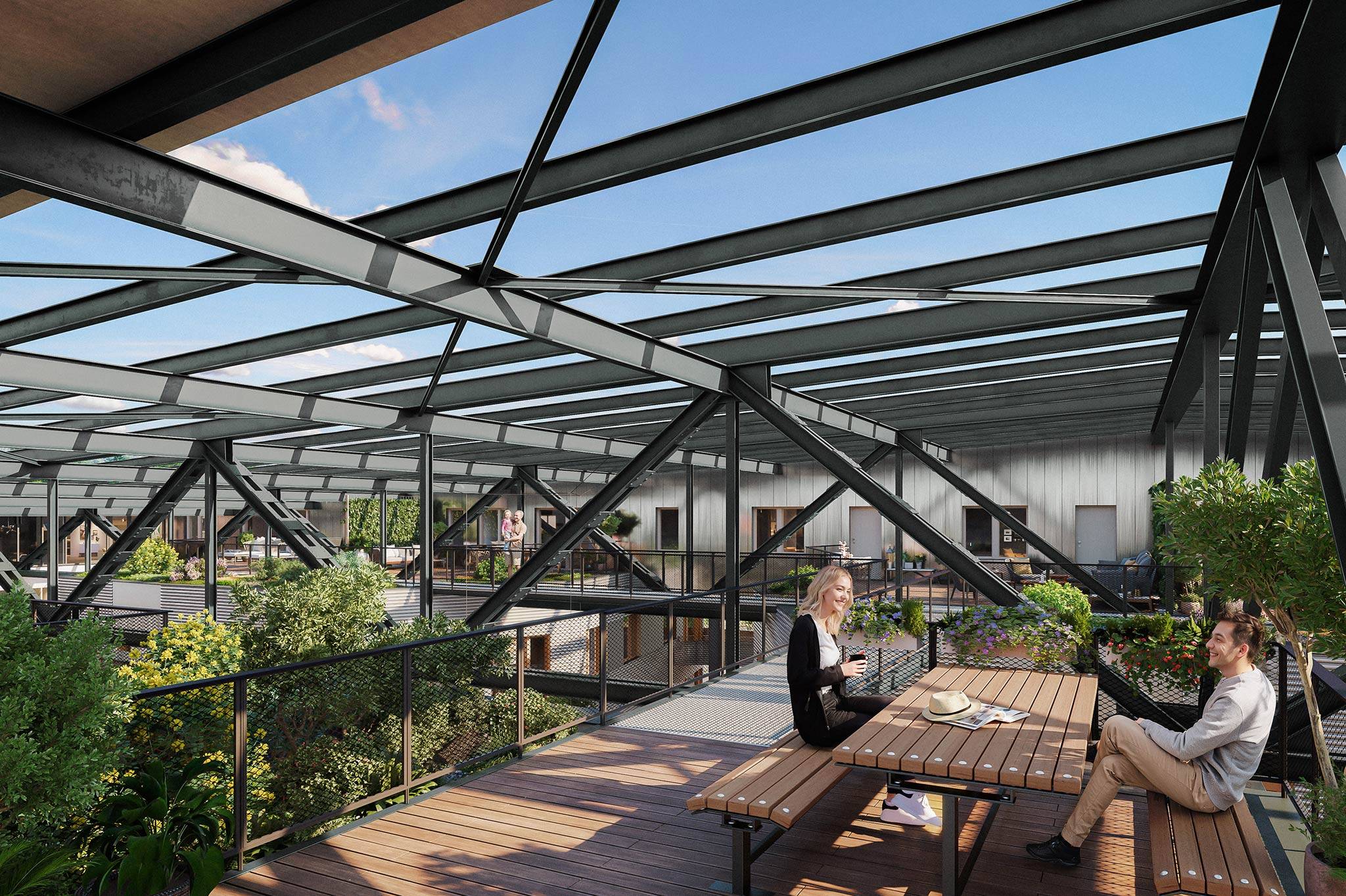 Gemeinschaft auf Augenhöhe: Die Dachterrasse der Endmontagehalle bietet Raum für Begegnung, Ausblick und ein Wohngefühl zwischen Himmel und Geschichte.